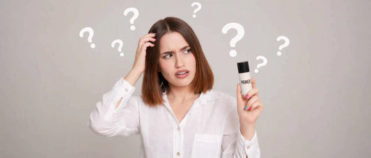 An image of a woman confused about using primer